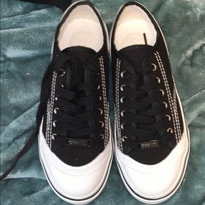 Chanel black canvas lace up sneakers
